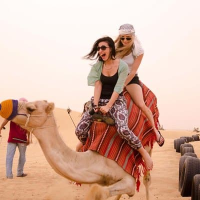 Camel Ride in Desert with Dune Bashing, BBQ Dinner and Belly Dance