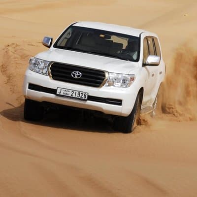 Premium Red Dune Desert Safari,BBQ dinner, camel ride, live show at Majilis camp