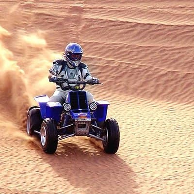 Dubai Morning Desert Safari with Quad Bike, Camel & Dune Bashing
