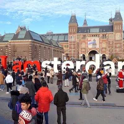 Amsterdam in a Nutshell 4 Hour Private Car Tour and Amsterdam Born Private Guide
