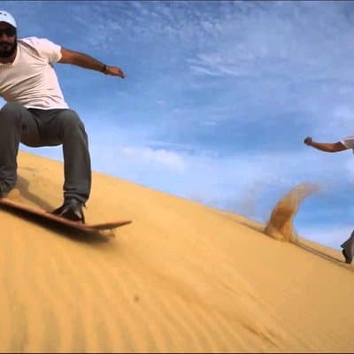 Private Desert Sandboarding Camel riding tour 4