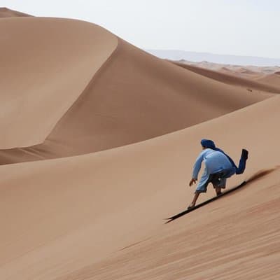 Private Desert Sandboarding Camel riding tour 5