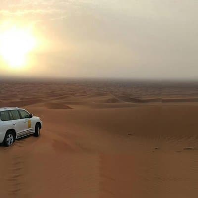 Morning Dune Bashing With Sand Boarding And Camel Ride in Red Dunes Desert