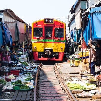 Damnoen Saduak Floating Market & Maeklong Train Market Tour