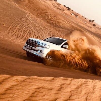 Red Dune Desert Safari with BBQ Dinner, Camel Ride & Live Shows 2