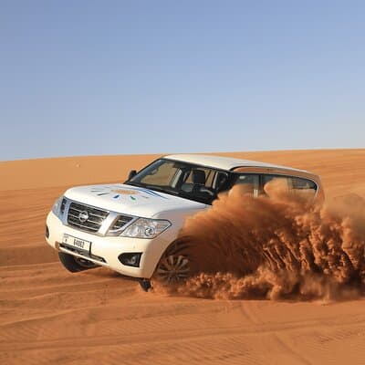 Morning Desert Safari in Dubai with Camel Ride & Sand Boarding