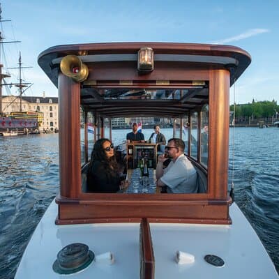 Private Boat Tour Amsterdam - 90 Min incl. welcome drink on historic saloon boat