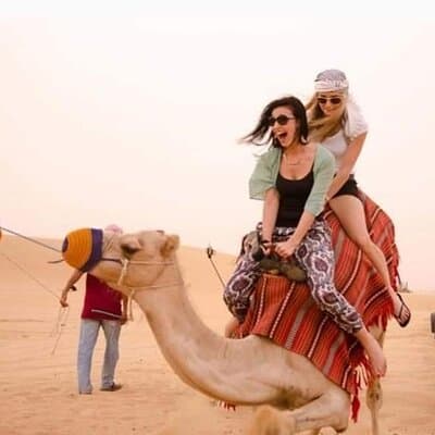 Desert Safari With BBQ Dinner, Camel Ride, Sand Boarding In Dubai 3
