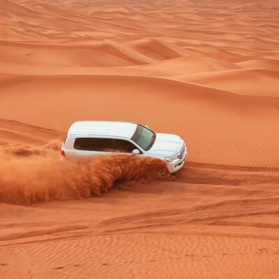 Evening Desert Safari Tour with Sand Surfing, BBQ Dinner (Exclusive Car) 2