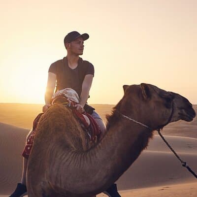 Morning Desert Safari with Camel Ride and Sandboarding