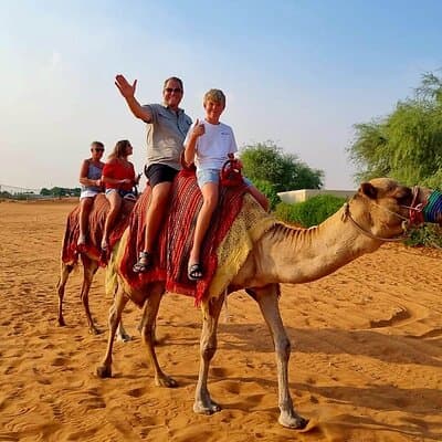 Camel Ride Safari in Red Dunes