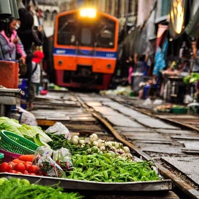 Meet Thai locals and tour Maeklong Railway Market with lunch 2