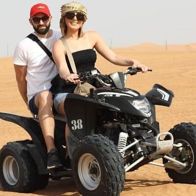 Dubai Desert Safari with Quad Bike, Camel Ride, Sandboard and BBQ 2
