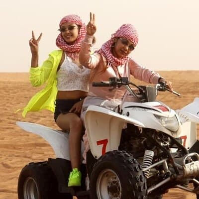 Dubai Desert Safari with Quad Bike, Camel Ride, Sandboard and BBQ 5