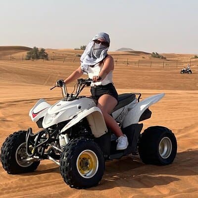 30 Min Quad Biking Tour In Dubai With Camel Ride & Sand Boarding 2