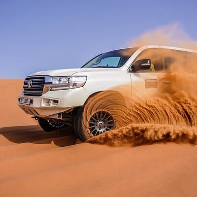 Dubai: Morning Quad bike & Safari Adventure , Sandboarding, camel 4