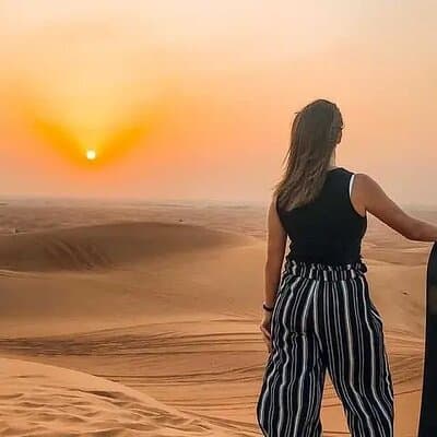 Private Morning Red Dune Safari with Camel Ride & Sandboarding