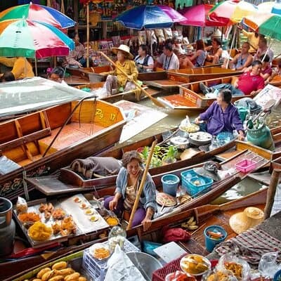 Maeklong Railway Market & Damnoen Saduak Market Paddle Boat Tour