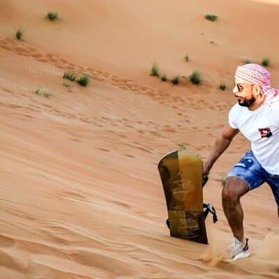 Lahbab Red Dunes Safari with Camel Ride, Sandboard & BBQ 5