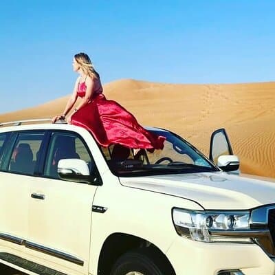 Private Morning Safari Camel Ride, Dune Bashing and Sandboarding