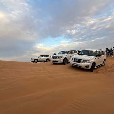 Morning Red Dune Desert Safari Camel Ride and Sandboarding