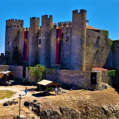 Tranquility to Thrills: Obidos,Alcobaca and Nazare Private Tour