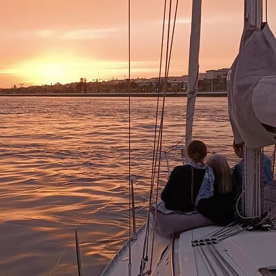 Sunset sailing boat trip in Lisbon with snacks