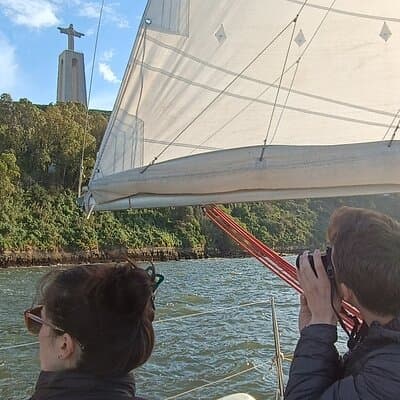 Sunset sailing boat trip in Lisbon with snacks 5