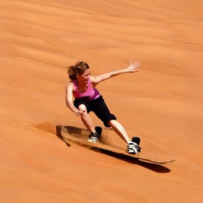Desert Safari Dubai with BBQ Dinner, Sand Boarding & Camel Ride 3