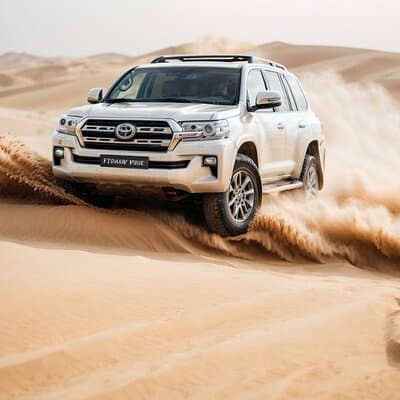 Desert Safari Dubai with BBQ Dinner, Sand Boarding & Camel Ride