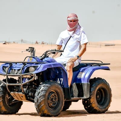 Desert Safari With BBQ Dinner, Quad Bike & Camel Ride from Dubai 5