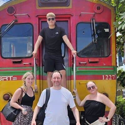 Maeklong Railway and Damnoen Saduak Floating Market Guide Tour