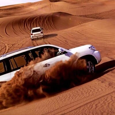Dubai: Desert Safari, Quad Bike, Camel Ride and Sandboarding 4