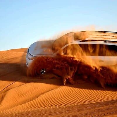 Dubai: Desert Safari, Quad Bike, Camel Ride and Sandboarding