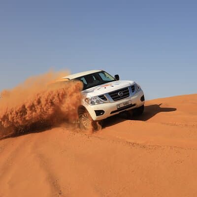 Dubai Desert Safari with BBQ, Camel Ride, Sand Board, Live Shows