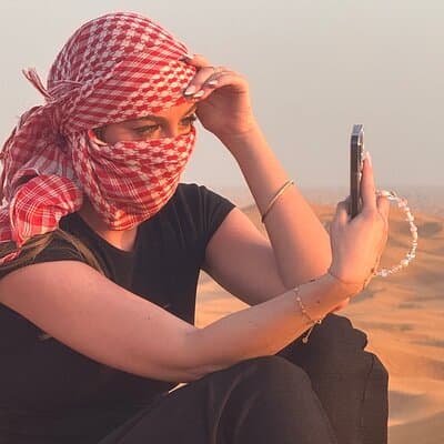 Premium Desert Safari Dubai , Camel Ride Sand board , BBQ & Shows 3