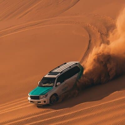 Dubai Sunset Desert Safari, sandboarding & camels with transfers 2