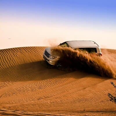 Exclusive Desert Safari Dubai with Camel Ride & Sandboarding 4