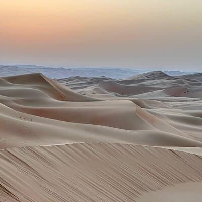 Private Sunrise Desert Safari Tour with Camel ride & Sandboarding 2