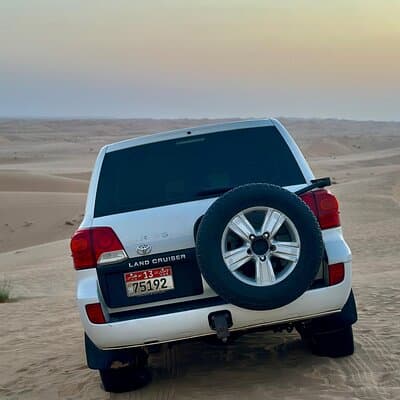 Private Sunrise Desert Safari Tour with Camel ride & Sandboarding 3
