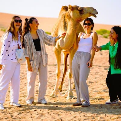 Private Sunrise Desert Safari Tour with Camel ride & Sandboarding 4
