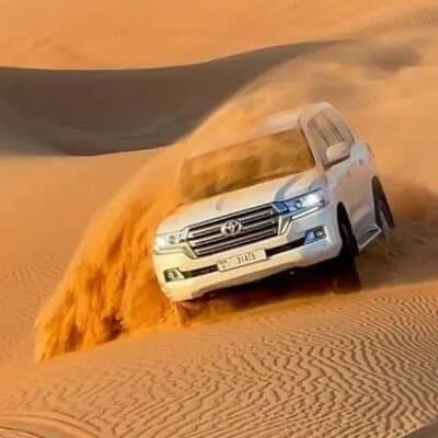 Dubai Desert Safari with Dune Bashing, Camel Ride and BBQ Dinner 2