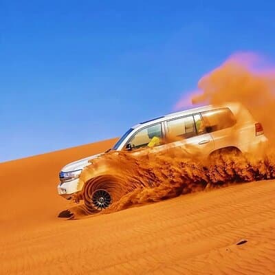 “Private Dubai Desert Safari – Dune Bashing, Camel Ride & BBQ”