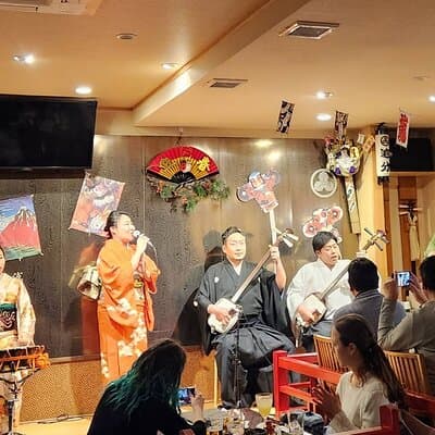 Tsugaru shamisen performance over traditional dinner 3
