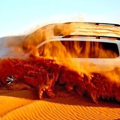 Red Dune Desert Safari with BBQ Dinner, Camel Ride & Live Shows 4