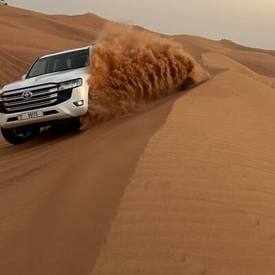 Dubai Evening Desert Safari: 4x4 Pickup/Drop, Camel, BBQ & Shows 2