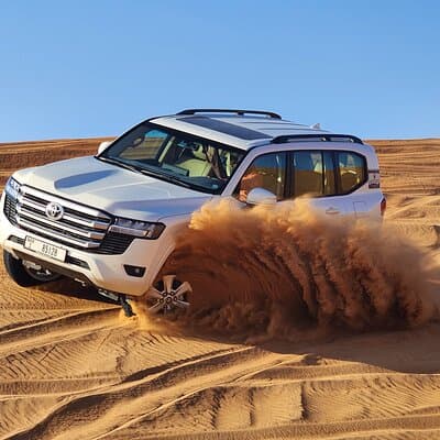 Evening Dubai Desert Safari with Quad Biking & Sandboarding