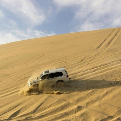 Dubai Evening Desert Safari with Dune Bashing & BBQ Dinner