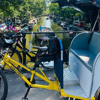 Explore Amsterdam in 75 Minutes – Pedicab Rickshaw City tour