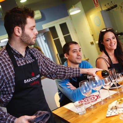 Premium Paella & Tapas Feast: Unlimited Wine & Rambla Views 5